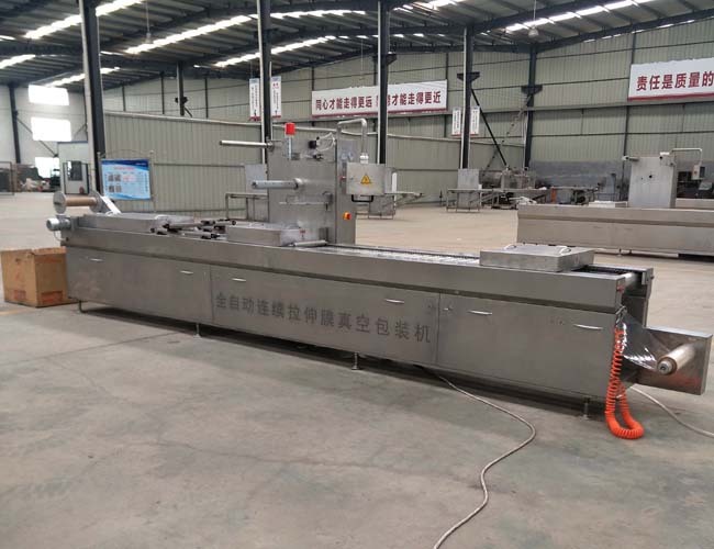 全自動拉伸膜真空包裝機使用現場