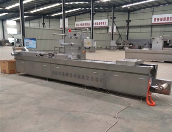 全自動(dòng)拉伸膜真空包裝機(jī)使用現(xiàn)場(chǎng)