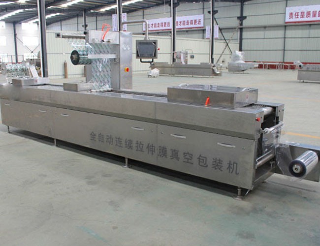 全自動(dòng)拉伸硬盒氣調(diào)包裝機(jī)使用現(xiàn)場(chǎng)